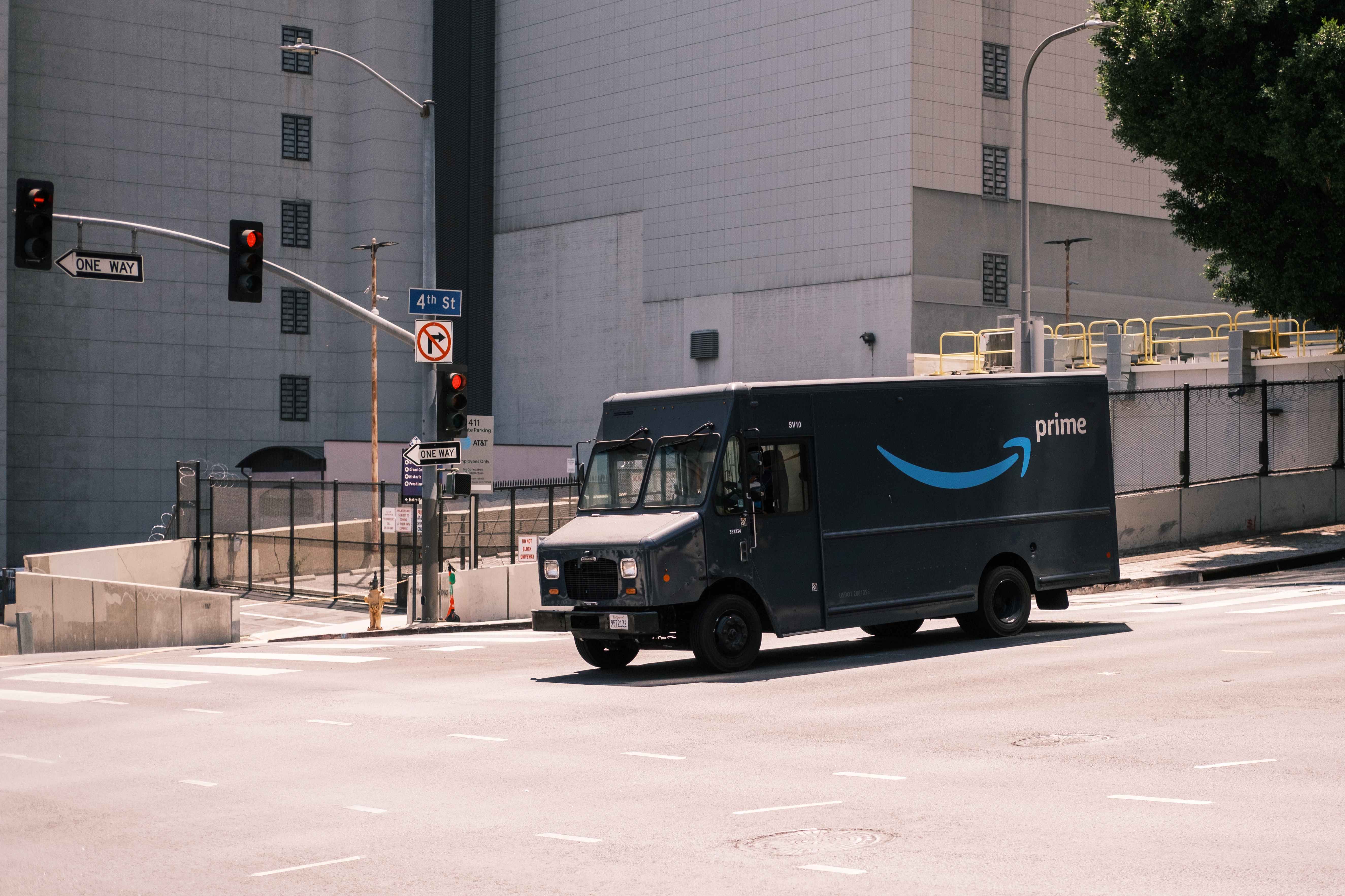 Amazon Prime truck outside warehouse
